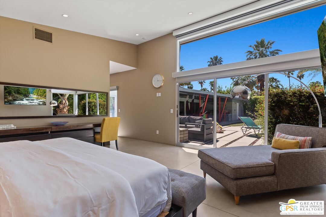 1349 Sagebrush Road Palm Springs, CA 92264 - Photo 36 of 61 a bedroom with a large bed and a window