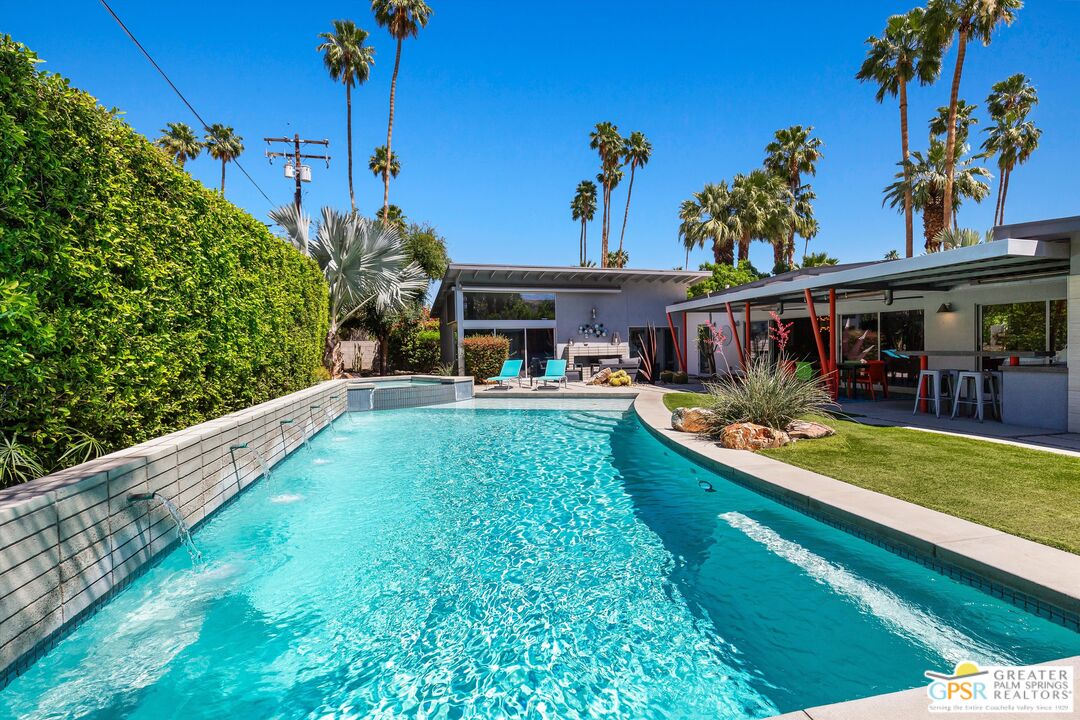 1349 Sagebrush Road Palm Springs, CA 92264 - Photo 45 of 61 a view of a house with swimming pool
