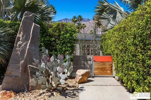a view of a television with a backyard