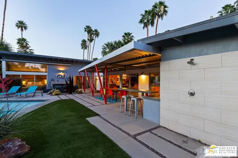 a view of a yard with an outdoor space