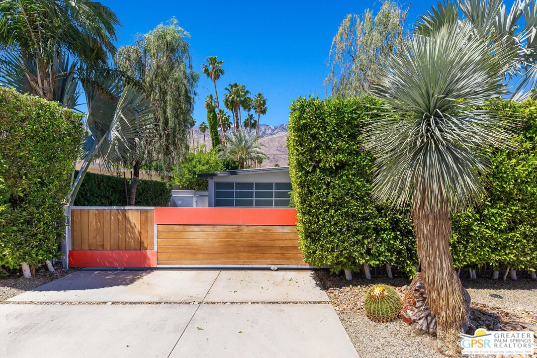 1349 Sagebrush Road Palm Springs, CA 92264 - Photo 6 of 61 a view of backyard with swimming pool and seating area