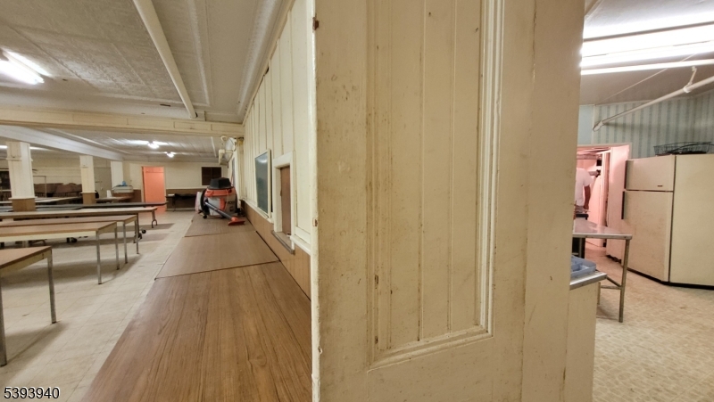 221 Spring Street Paterson, NJ 07503 - Photo 13 of 30 a view of a hallway with seating area