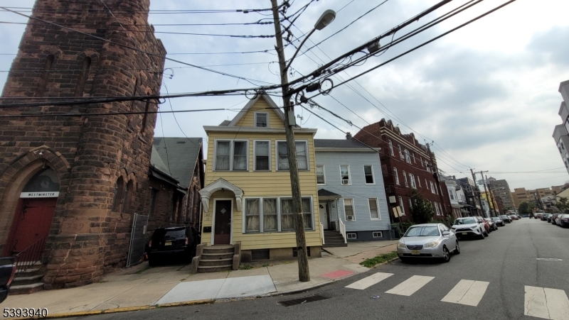 221 Spring Street Paterson, NJ 07503 - Photo 17 of 30 a view of a street with cars