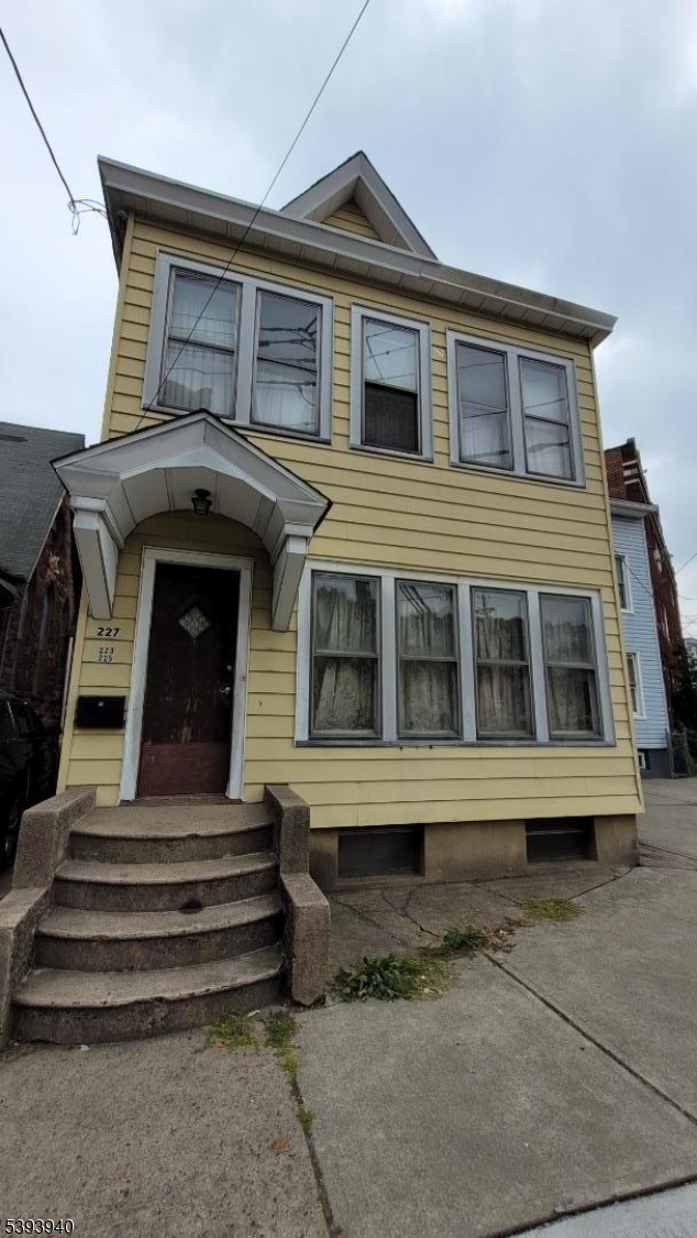 221 Spring Street Paterson, NJ 07503 - Photo 19 of 30 a front view of a house