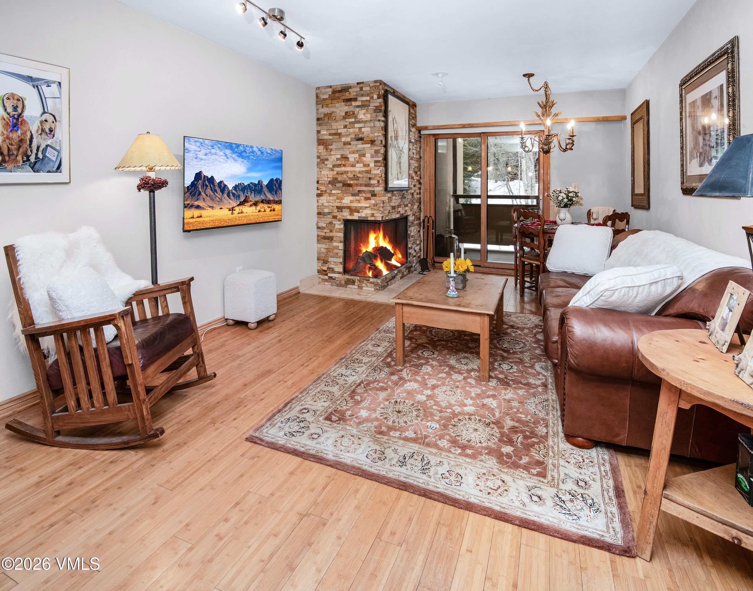 1650 Fall Ridge Road, Unit 202 Vail, CO 81657 - Photo 4 of 32 a living room with furniture and a fireplace
