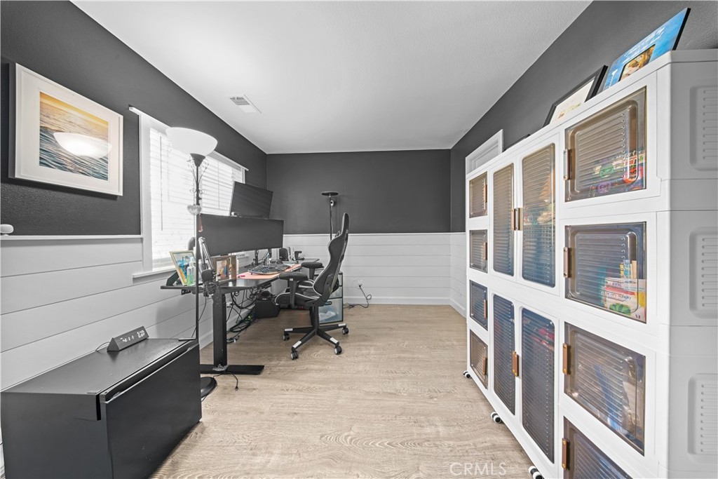 4 Potters Bend Ladera Ranch, CA 92694 - Photo 21 of 31 a view of a livingroom with workspace and a window