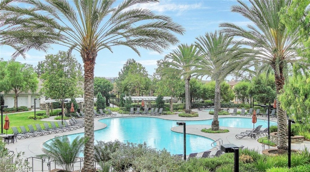 4 Potters Bend Ladera Ranch, CA 92694 - Photo 30 of 31 a view of a swimming pool with a table and chairs