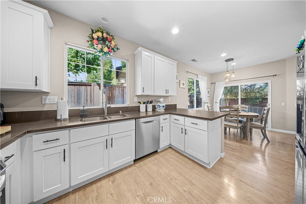 4 Potters Bend Ladera Ranch, CA 92694 - Photo 4 of 31 a kitchen with sink and cabinets