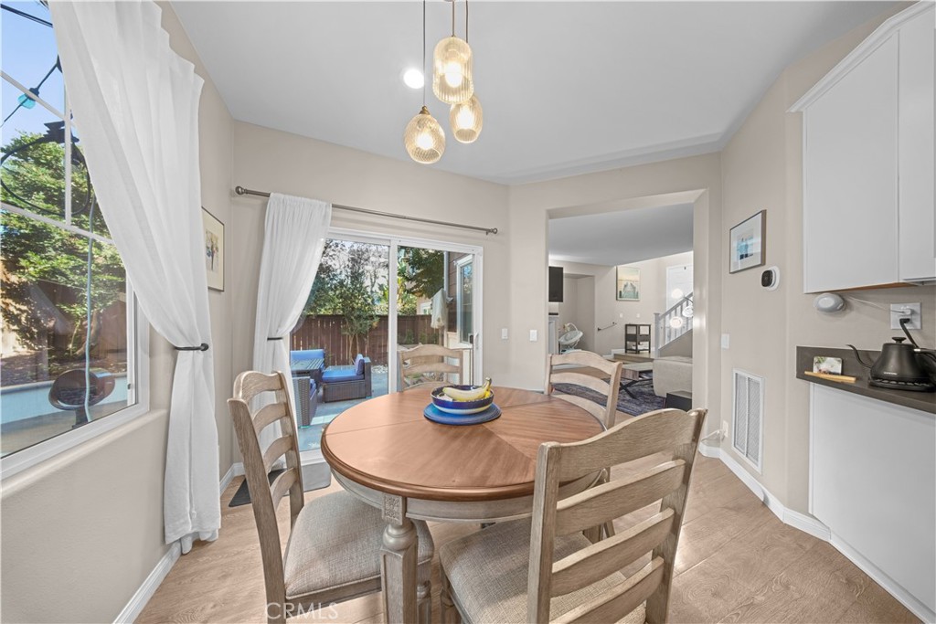 4 Potters Bend Ladera Ranch, CA 92694 - Photo 7 of 31 a view of a dining room with furniture window and outside view