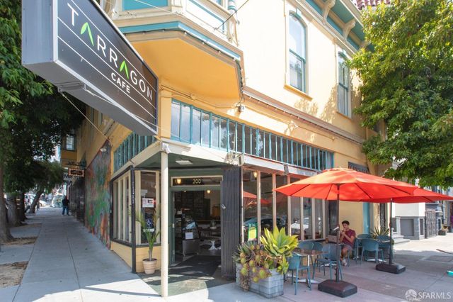 a vase of flowers sitting on a table in a living room