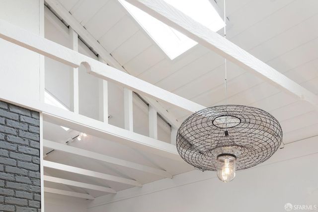 a view of staircase with white walls