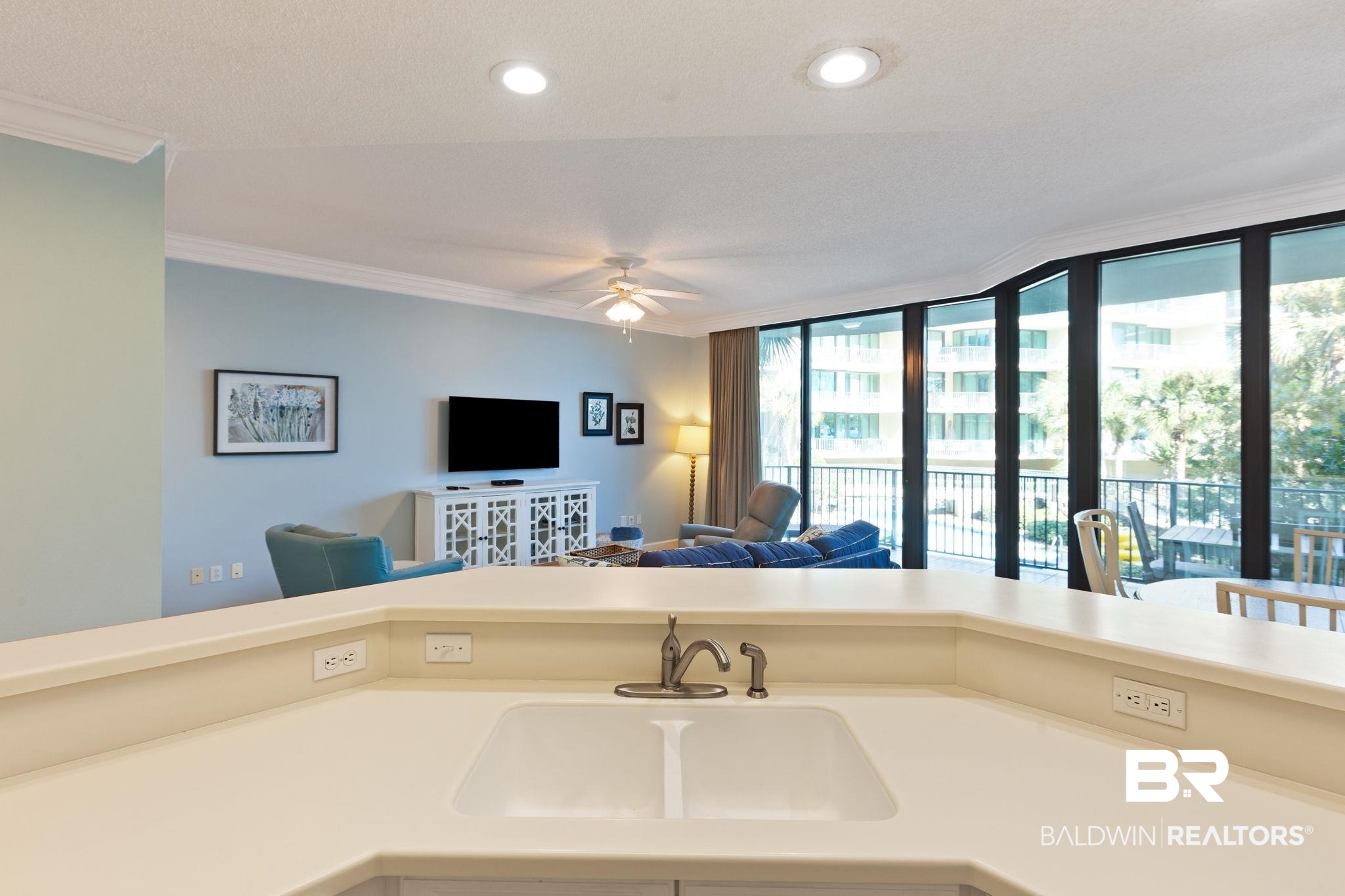 27580 Canal Road, Unit 1112 Orange Beach, AL 36561 - Photo 50 of 50 Kitchen featuring crown molding, open floor plan, light countertops, a ceiling fan, and recessed lighting