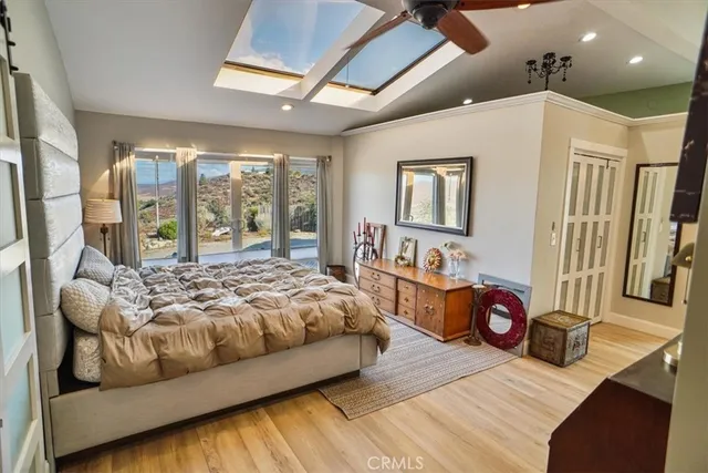 a bathroom with a sink a large mirror and a shower