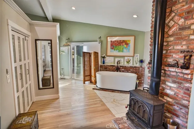 a bathroom with a sink mirror vanity and toilet