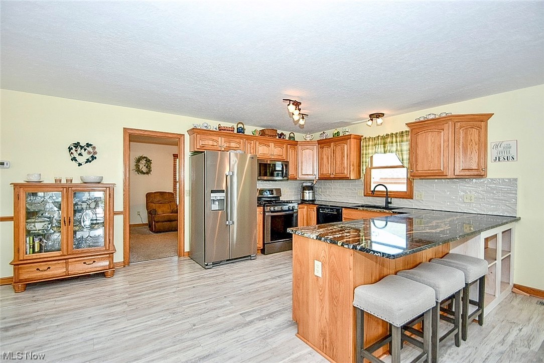 2332 Canfield Road Akron, OH 44312 - Photo 6 of 33 Updated kitchen, breakfast bar/ large counter space.