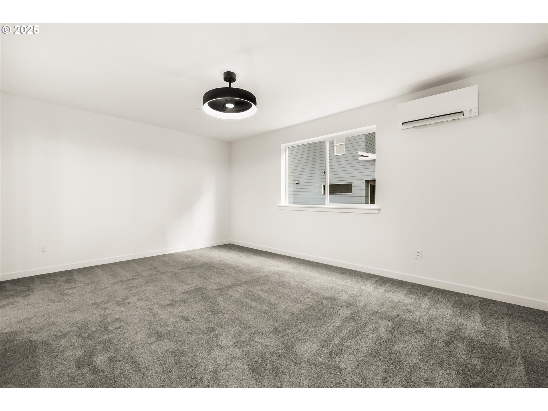 284 Northwest Mawrcrest Drive Gresham, OR 97030 - Photo 25 of 37 a view of an empty room with a window