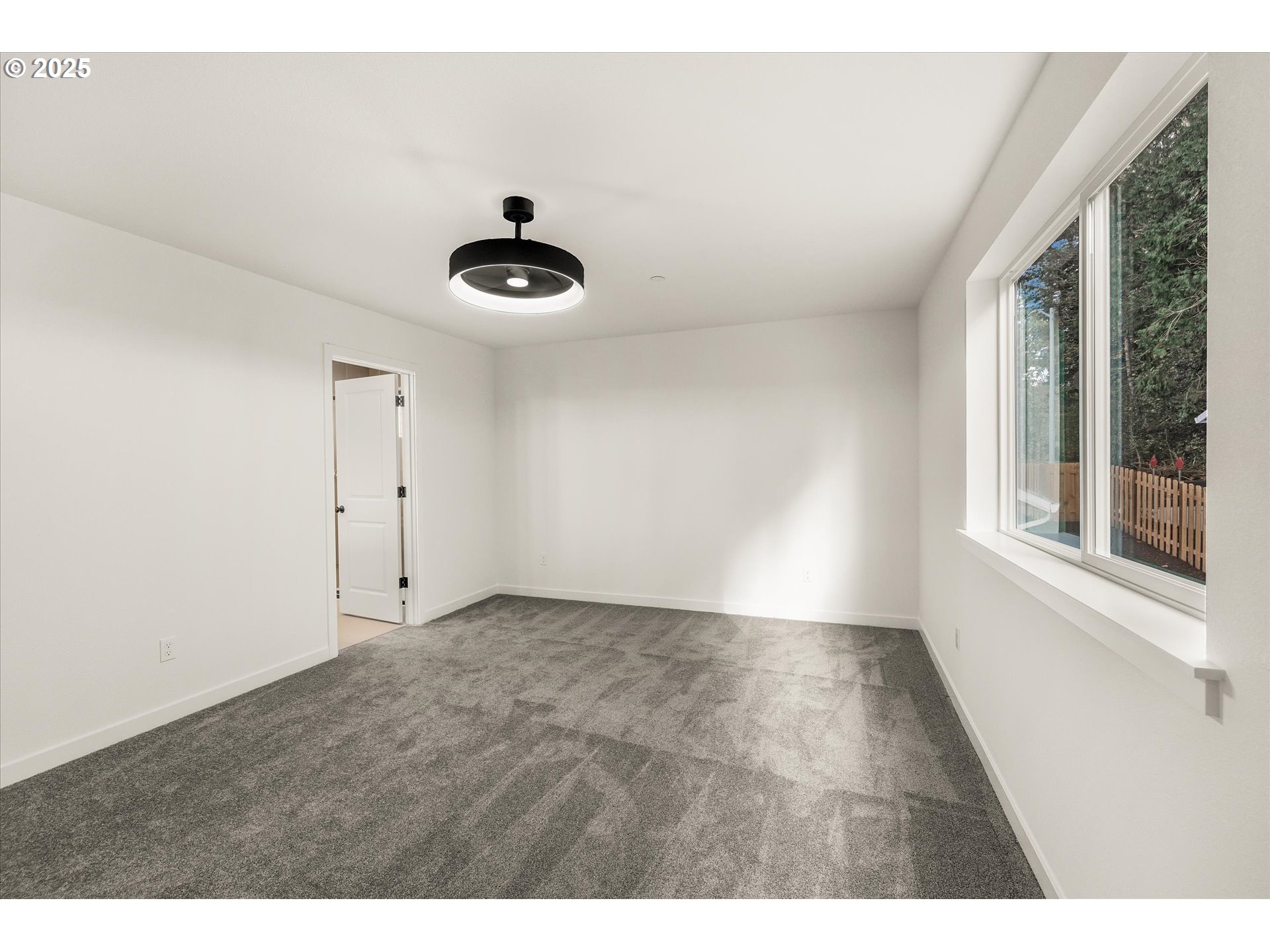 284 Northwest Mawrcrest Drive Gresham, OR 97030 - Photo 26 of 37 a view of an empty room with a window