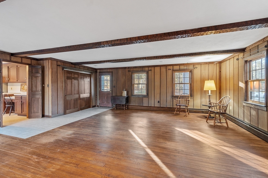 31 Mohawk Road Andover, MA 01810 - Photo 9 of 33 a view of an empty room with glass door and furniture