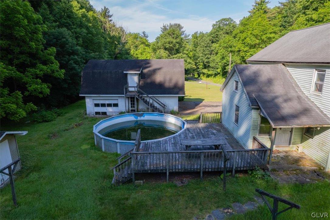 130 Christman Road Kunkletown, PA 18058 - Photo 16 of 44 an aerial view of a house with garden space and sitting area