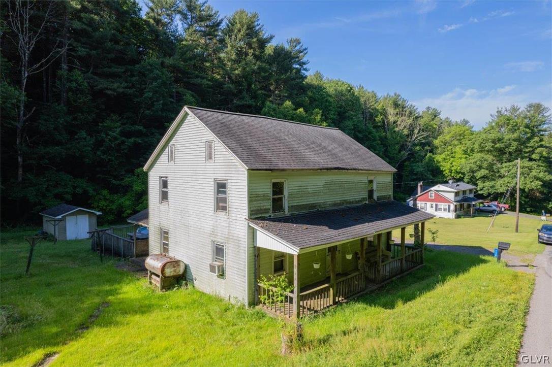 130 Christman Road Kunkletown, PA 18058 - Photo 20 of 44 a aerial view of a house with table and chairs in patio