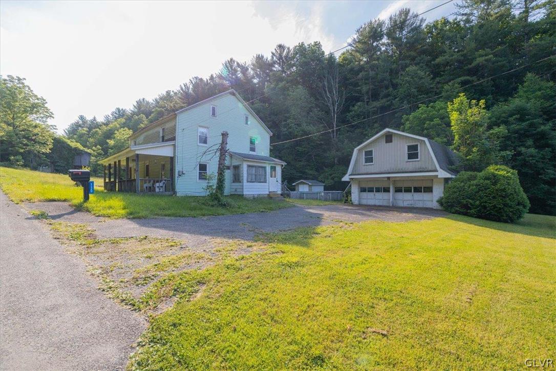 130 Christman Road Kunkletown, PA 18058 - Photo 3 of 44 a front view of house with yard and swimming pool