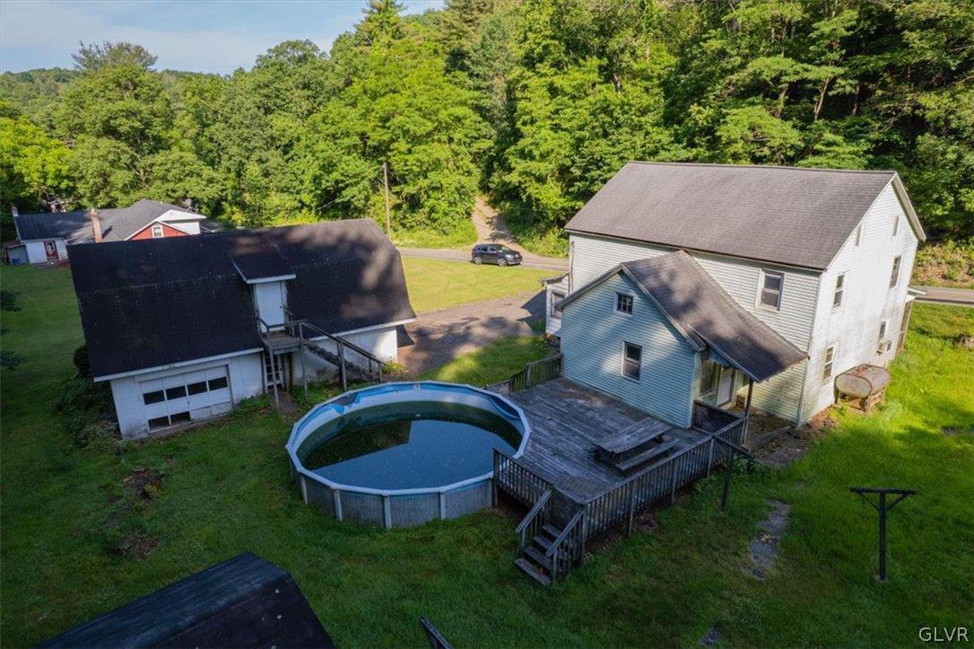 130 Christman Road Kunkletown, PA 18058 - Photo 4 of 44 an aerial view of a house with backyard garden and outdoor seating