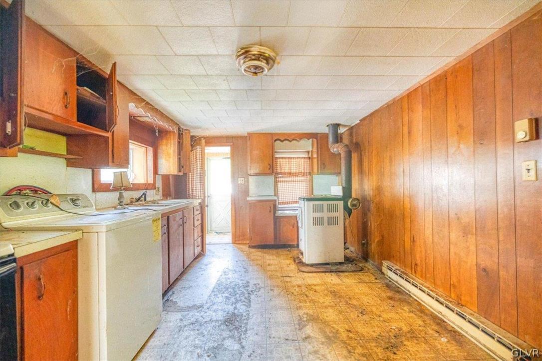 130 Christman Road Kunkletown, PA 18058 - Photo 7 of 44 a room with a stove and a kitchen view