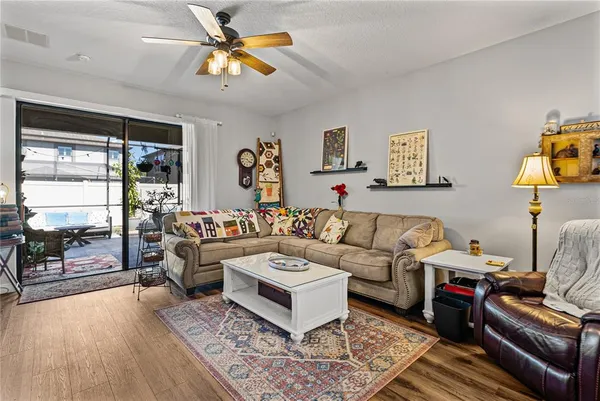 a living room with furniture and a window