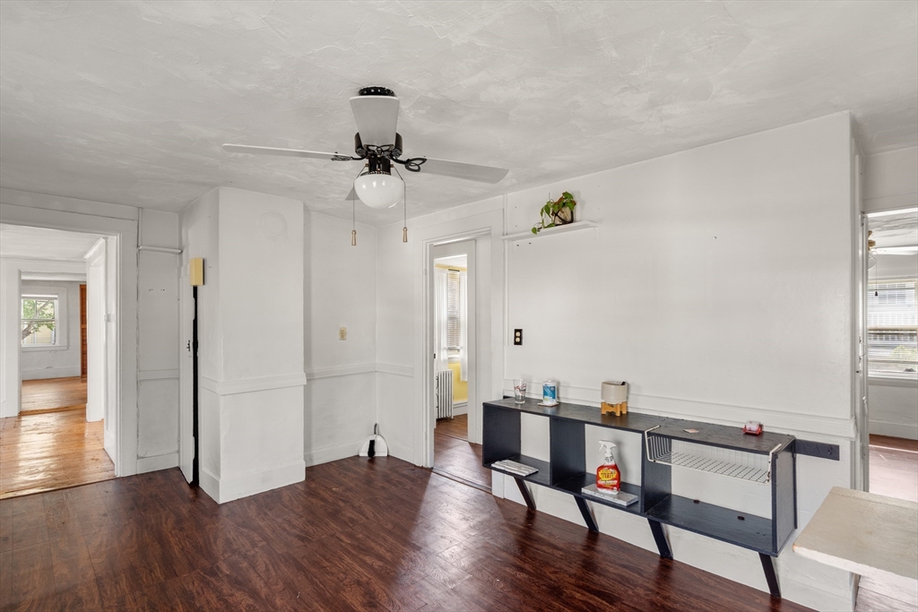 49 Summer Street Natick, MA 01760 - Photo 11 of 39 a view of a workspace with furniture and wooden floor
