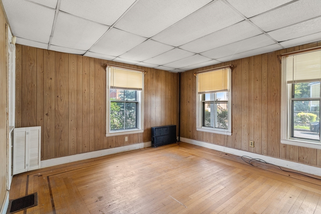 49 Summer Street Natick, MA 01760 - Photo 14 of 39 an empty room with windows