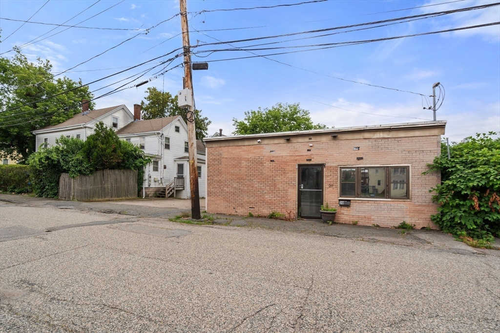 49 Summer Street Natick, MA 01760 - Photo 17 of 39 front view of a house with a street