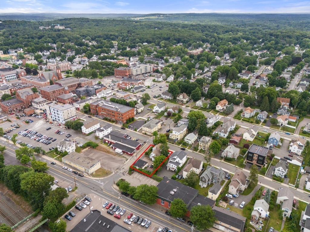 49 Summer Street Natick, MA 01760 - Photo 26 of 39 an aerial view of residential houses with outdoor space