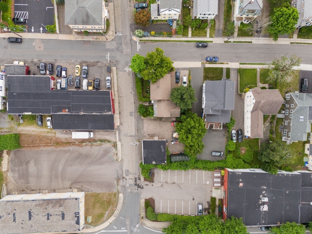 49 Summer Street Natick, MA 01760 - Photo 30 of 39 a aerial view of a house with a garden and plants