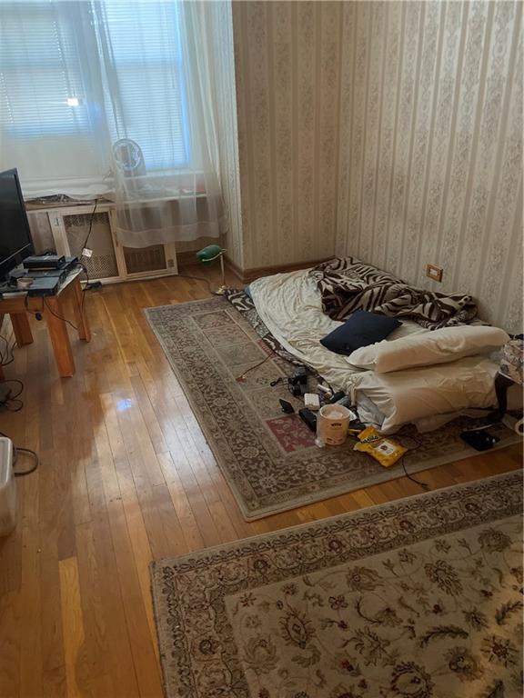 7259 Shore Road, Unit 2K Brooklyn, NY 11209 - Photo 11 of 19 a view of a room with wooden floor