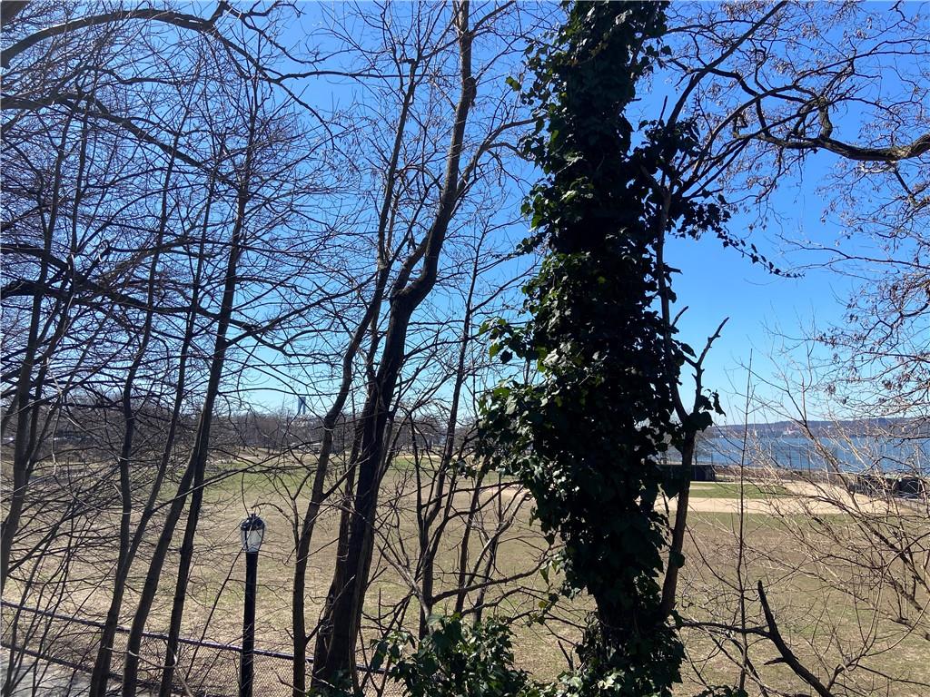 7259 Shore Road, Unit 2K Brooklyn, NY 11209 - Photo 15 of 19 a view of a backyard of the house