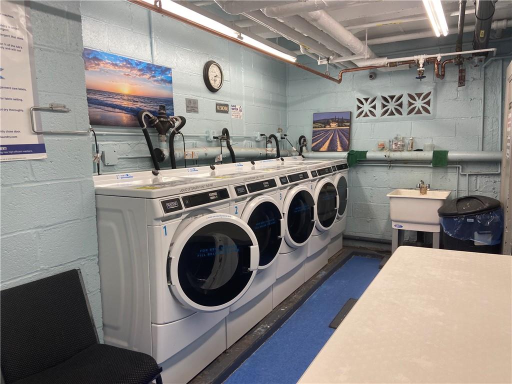 7259 Shore Road, Unit 2K Brooklyn, NY 11209 - Photo 17 of 19 a utility room with dryer and washer