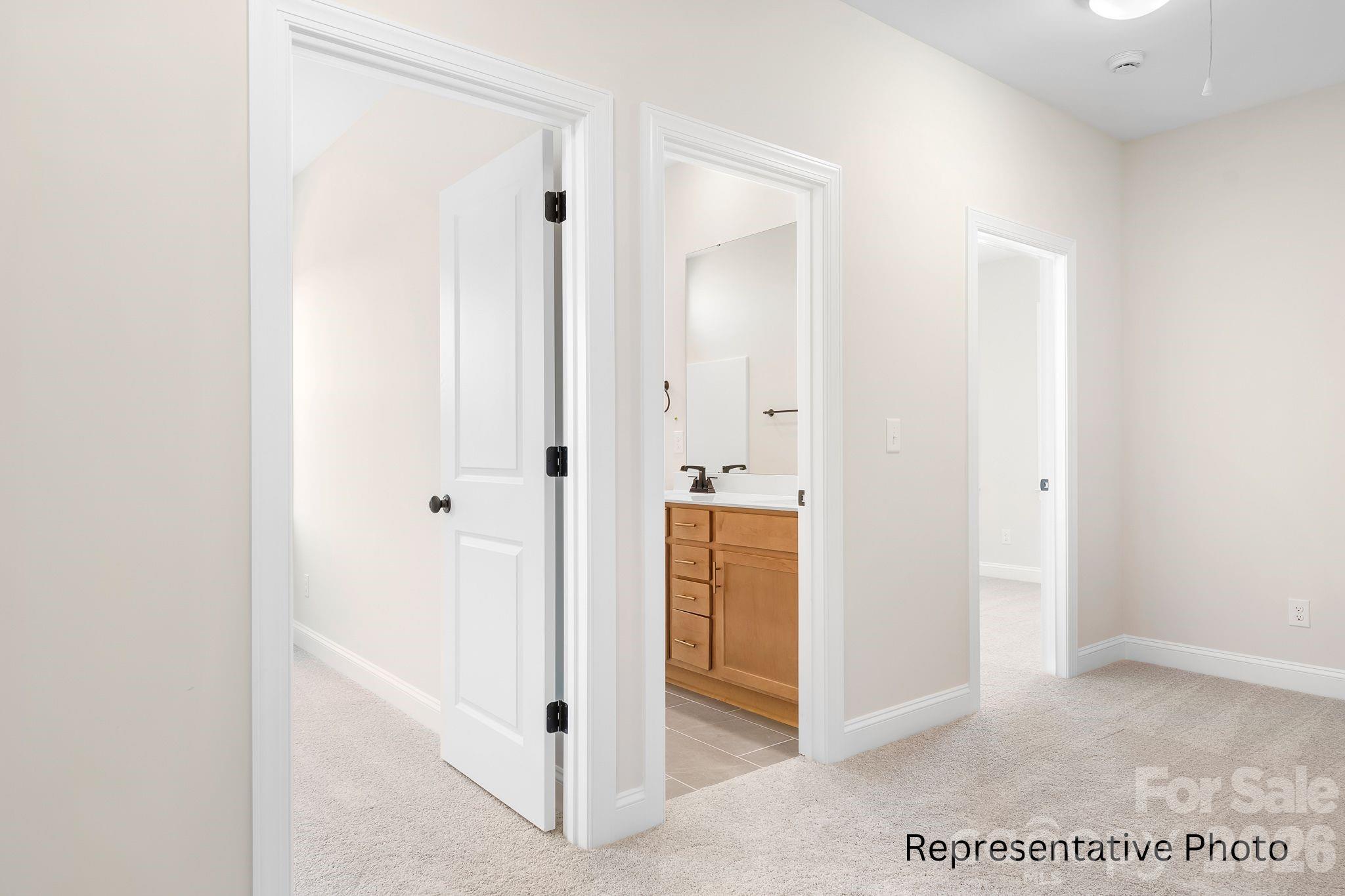 4172 Millstream Road, Unit 137 Denver, NC 28037 - Photo 17 of 28 a view of a bathroom with a shower