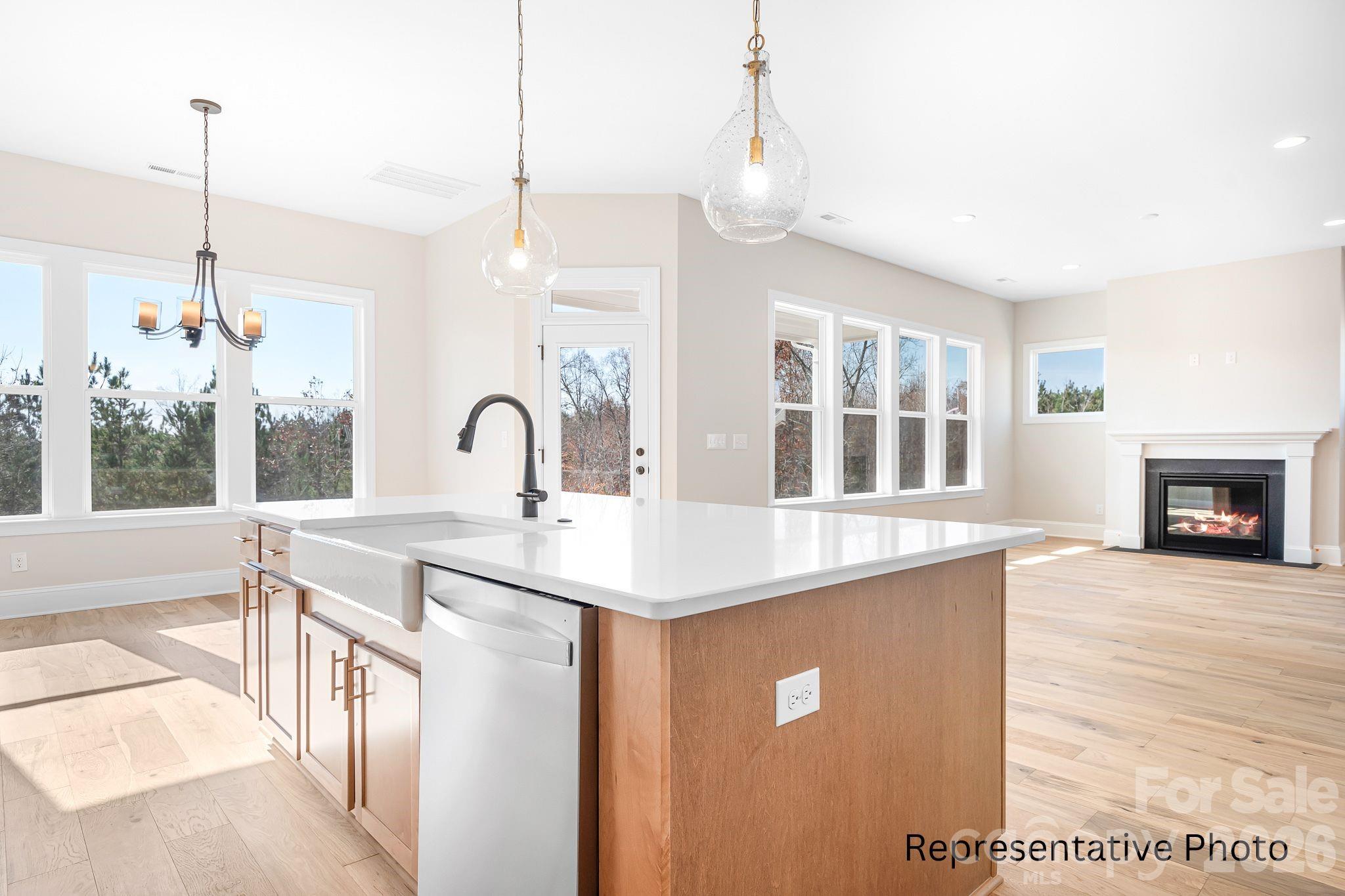 4172 Millstream Road, Unit 137 Denver, NC 28037 - Photo 6 of 28 a kitchen with a sink and a window