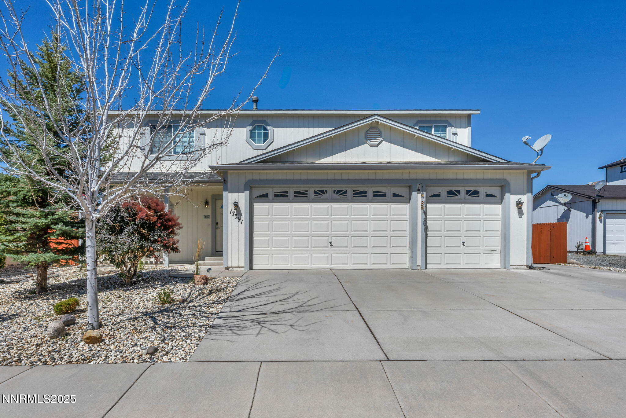 17391 Crystal Canyon Boulevard Reno, NV 89508 - Photo 1 of 63 a front view of a house with a garage