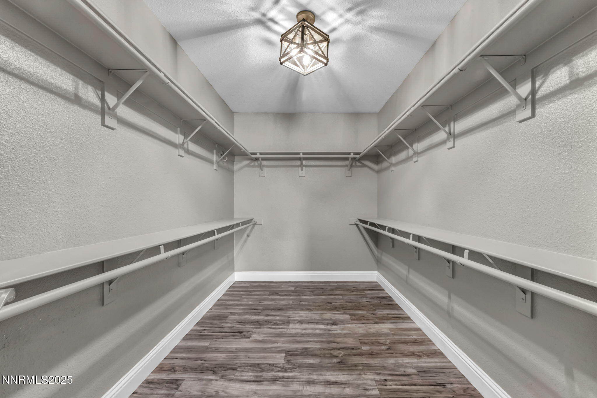 17391 Crystal Canyon Boulevard Reno, NV 89508 - Photo 26 of 63 a view of a room with racks on the wall