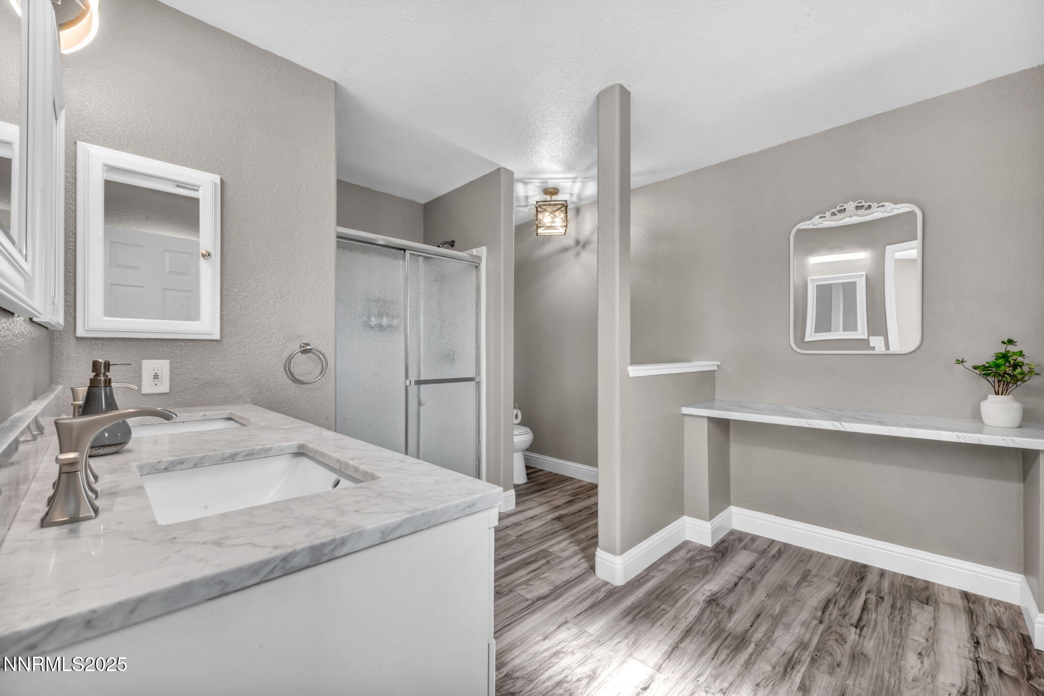 17391 Crystal Canyon Boulevard Reno, NV 89508 - Photo 27 of 63 a bathroom with a sink and a mirror