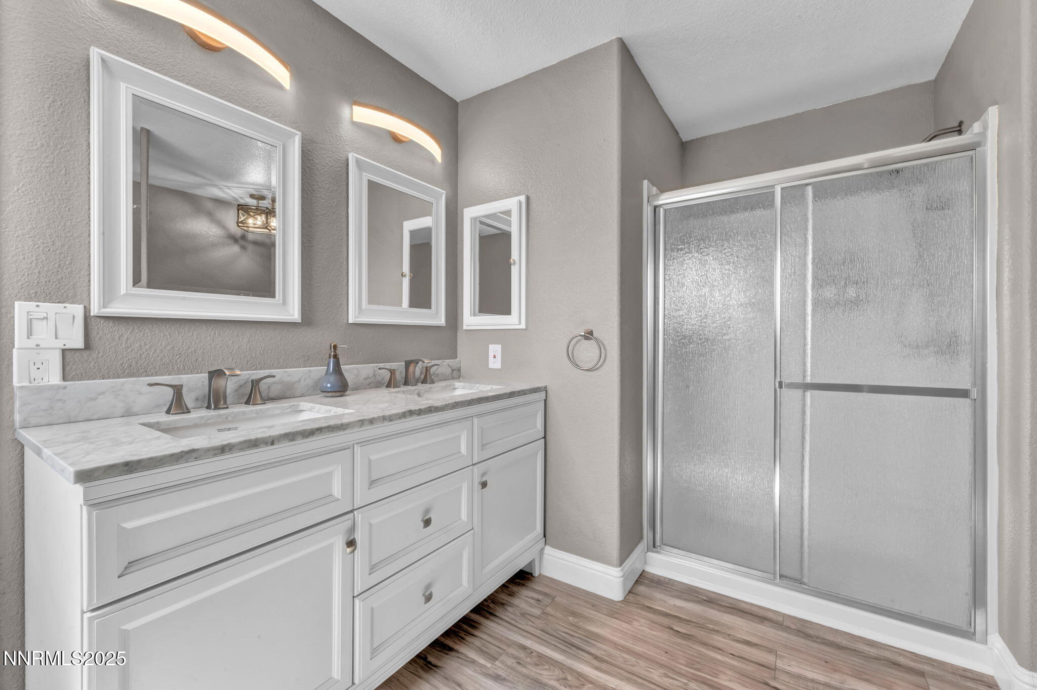 17391 Crystal Canyon Boulevard Reno, NV 89508 - Photo 30 of 63 a bathroom with a granite countertop sink mirror and vanity