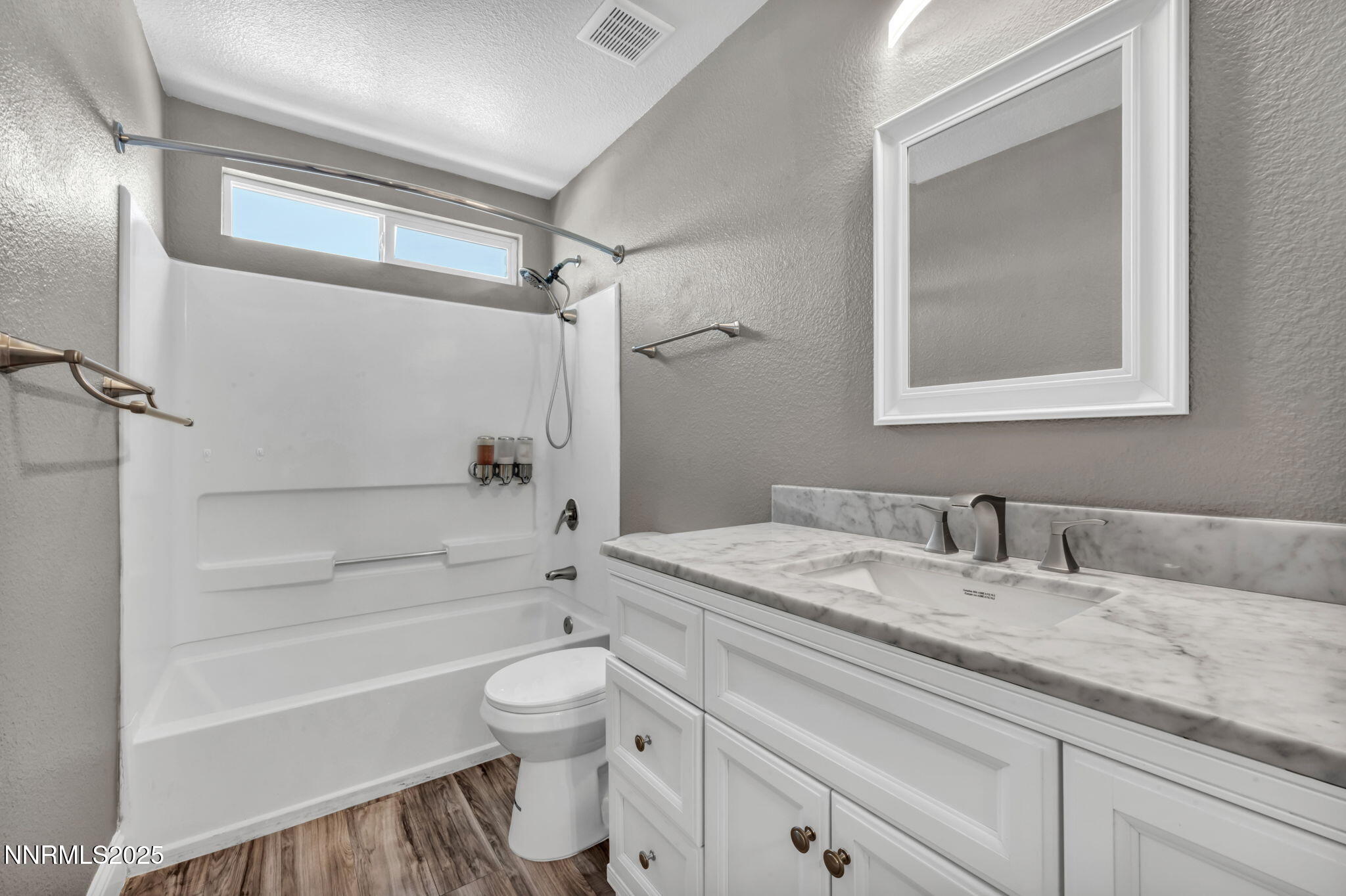 17391 Crystal Canyon Boulevard Reno, NV 89508 - Photo 42 of 63 a bathroom with a granite countertop sink toilet and shower