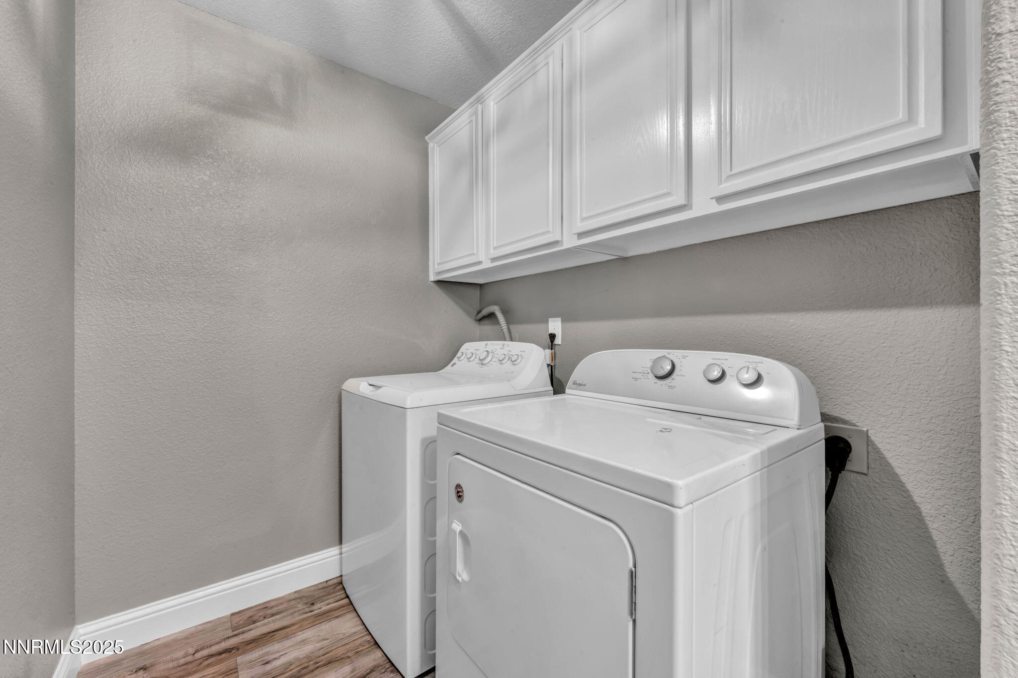 17391 Crystal Canyon Boulevard Reno, NV 89508 - Photo 44 of 63 a utility room with dryer and washer
