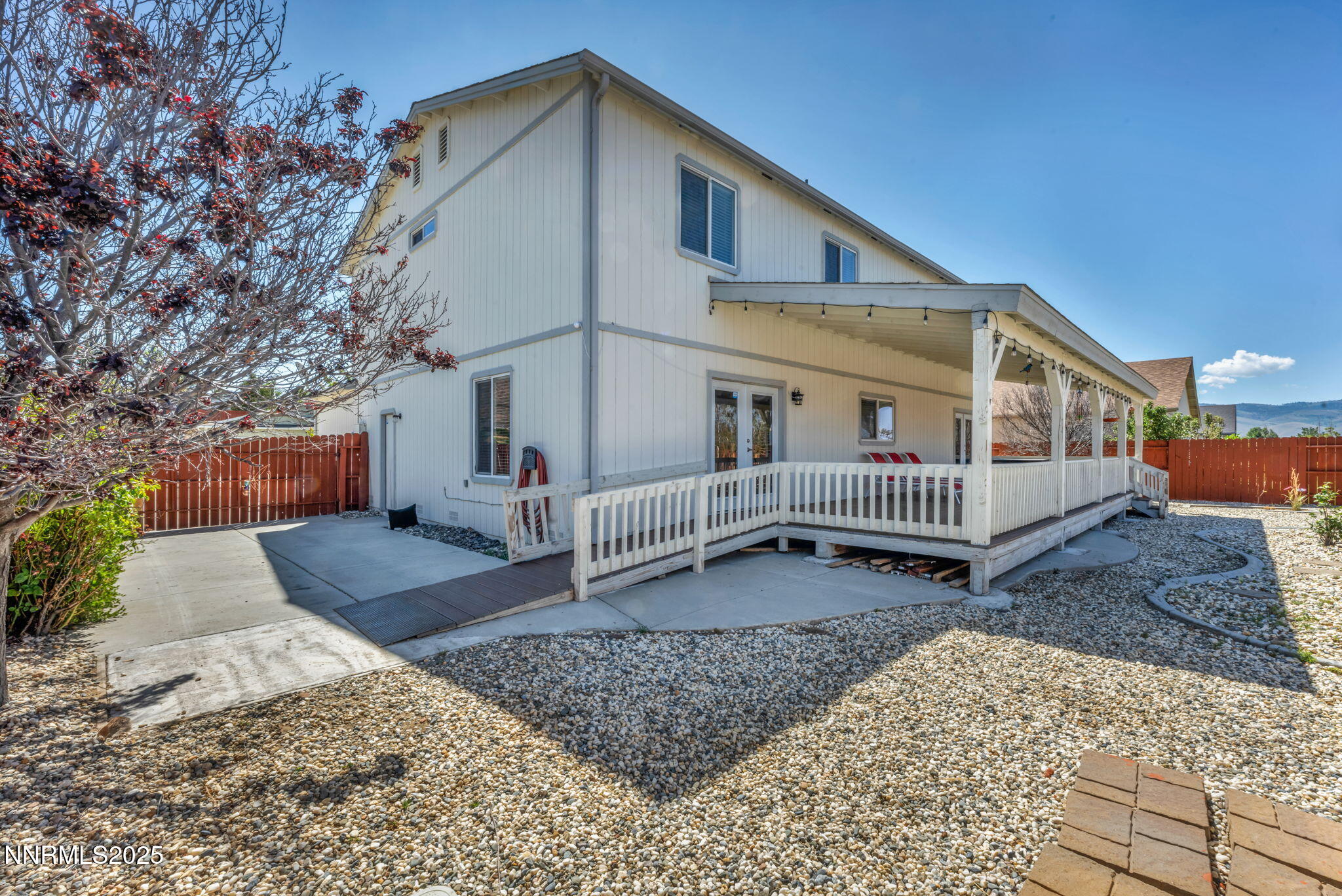 17391 Crystal Canyon Boulevard Reno, NV 89508 - Photo 54 of 63 a view of a house with a yard and wooden fence