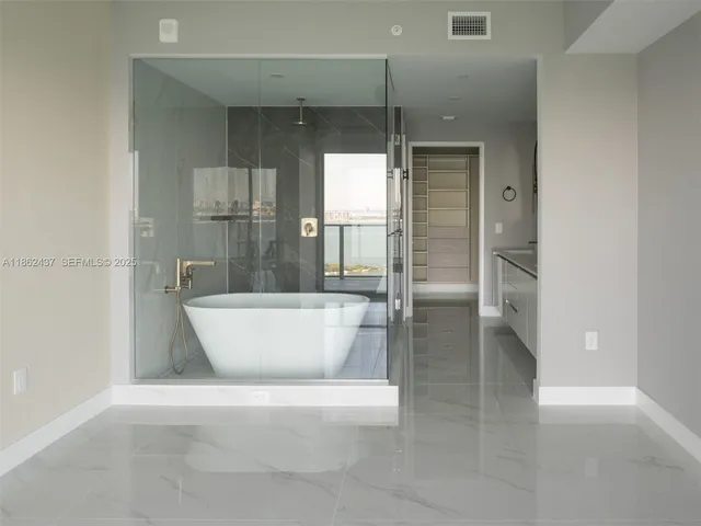 a view of an empty walk in closet