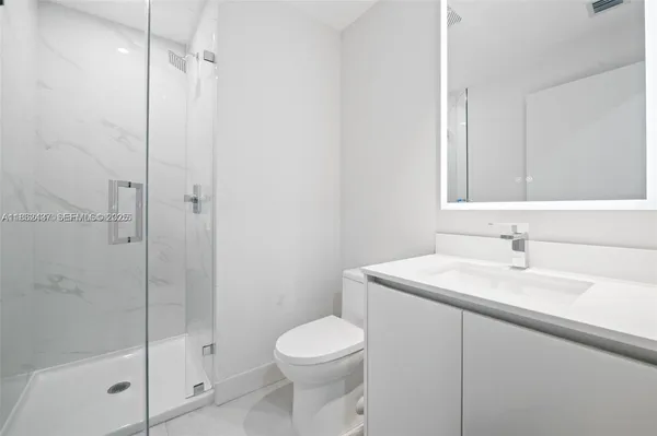 a view of a park with swings