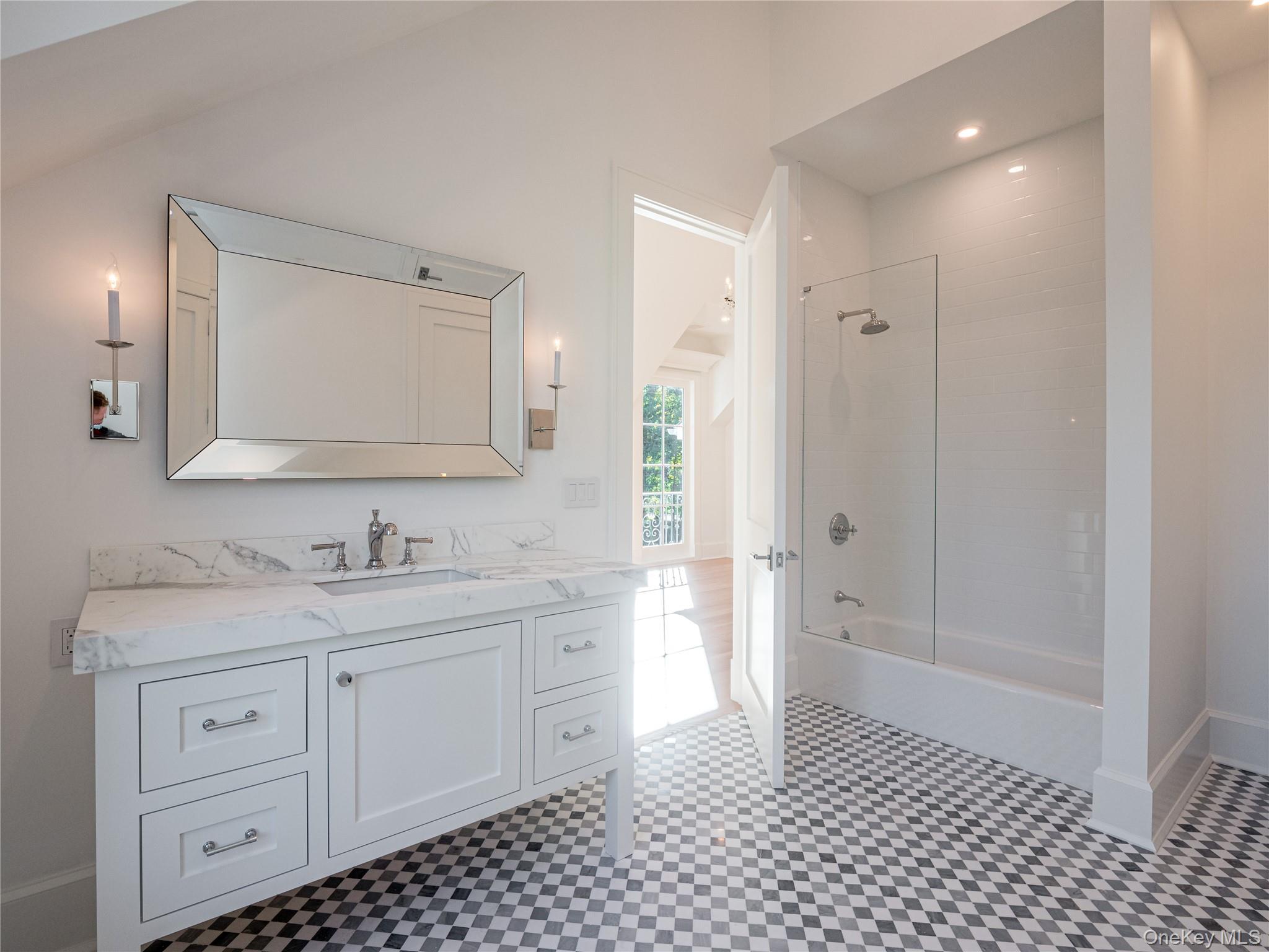 7 Carlton Road Bronxville, NY 10708 - Photo 25 of 35 a bathroom with a sink a toilet and shower