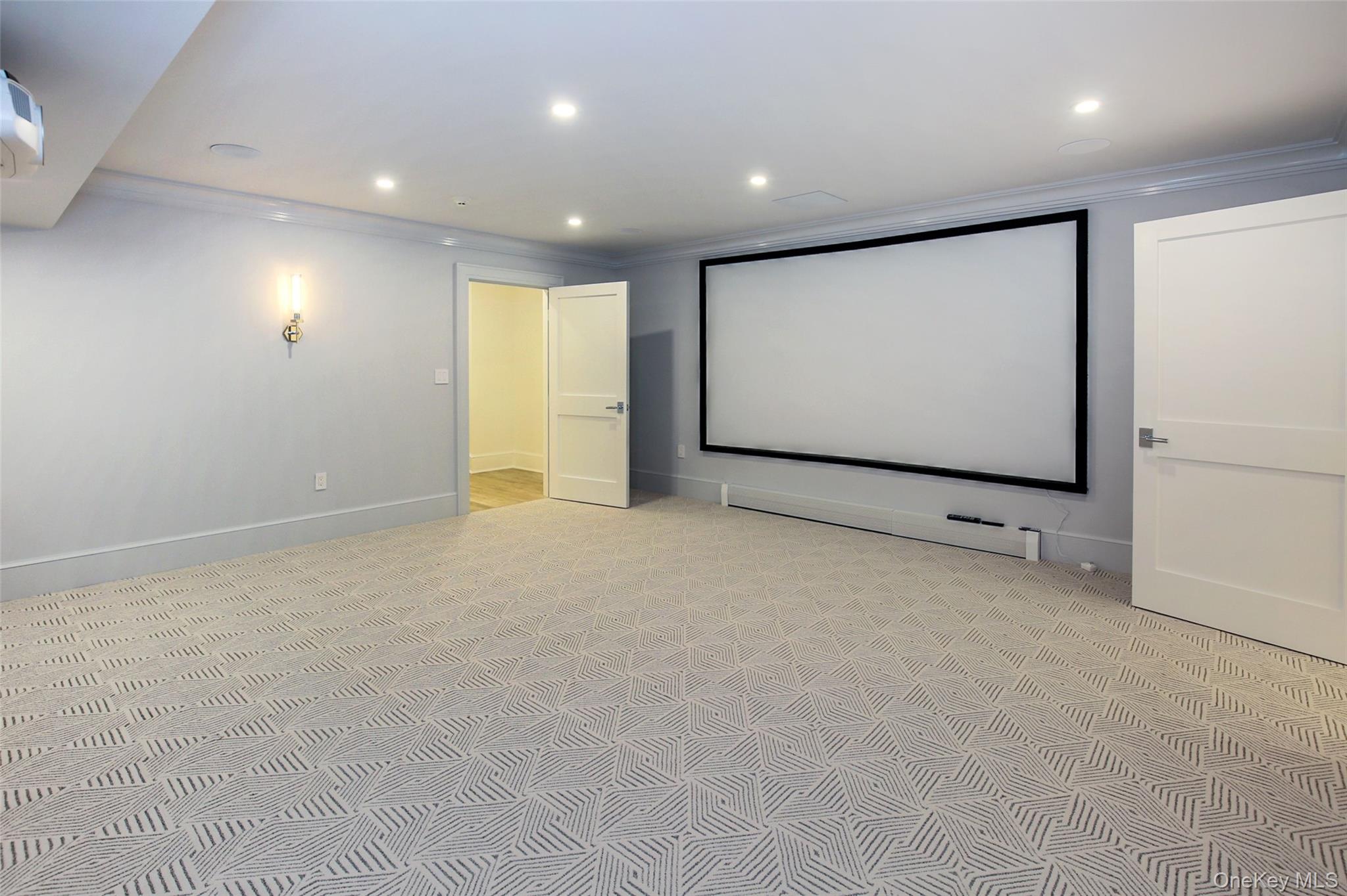 7 Carlton Road Bronxville, NY 10708 - Photo 26 of 35 a view of an empty room with wooden floor