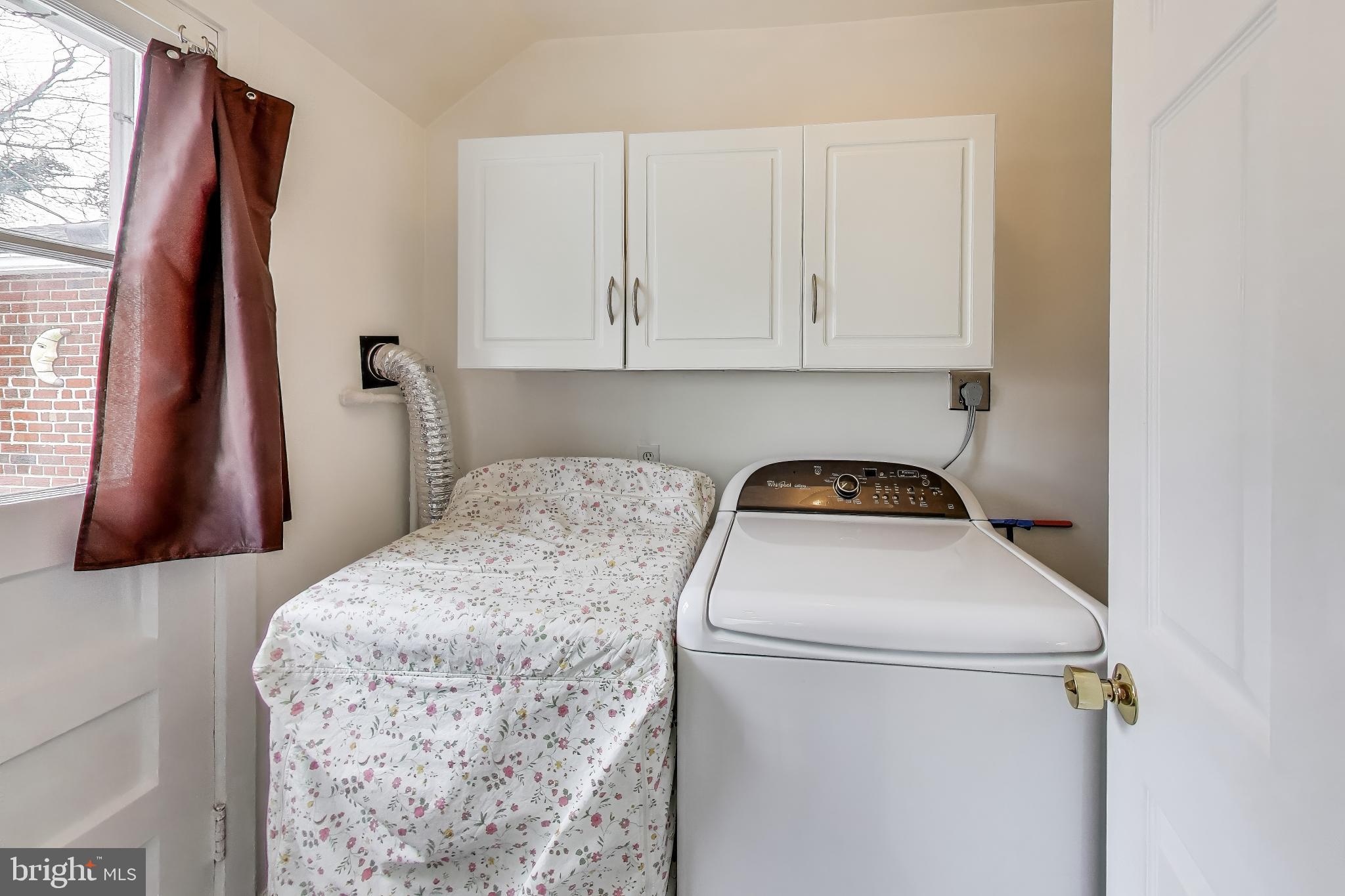 12609 Holdridge Road Silver Spring, MD 20906 - Photo 21 of 30 a utility room with dryer and washer